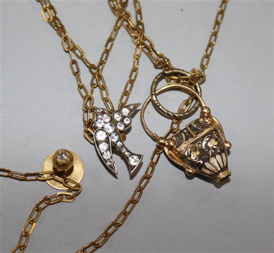 A gold and diamond stud, a paste set swallow brooch, a chain with pendant